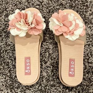These sandals are great in the house or outside. for a touch it has flowers
